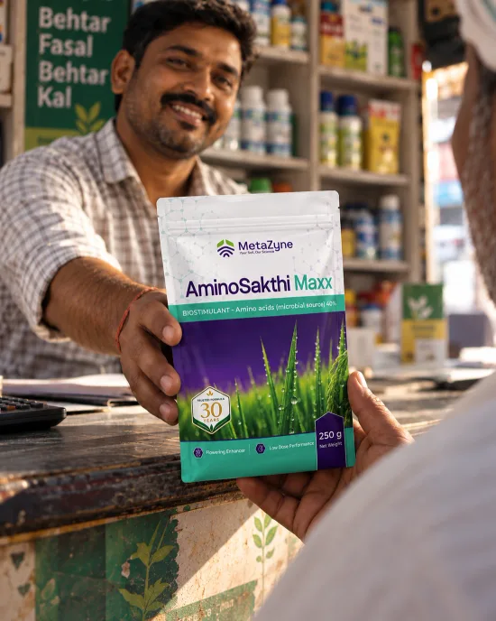 A shopkeeper handing a pouch of AminoSakthi Maxx across the counter to a farmer