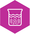 Granules dissolving in a beaker