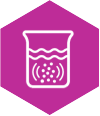 Granules dissolving in a beaker