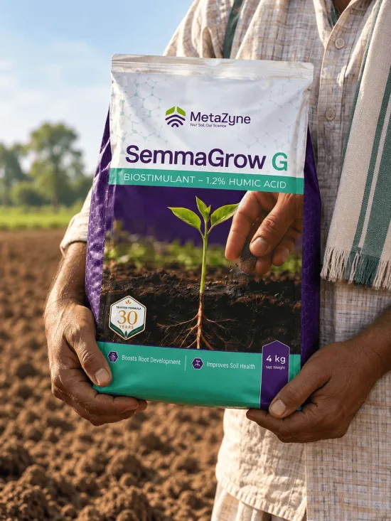 Farmer holding a SemmaGrow G bag in a freshly tilled field