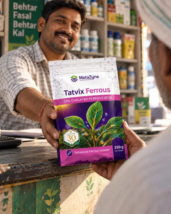Shopkeeper handing a Tatvix Ferrous pack across the counter to a farmer
