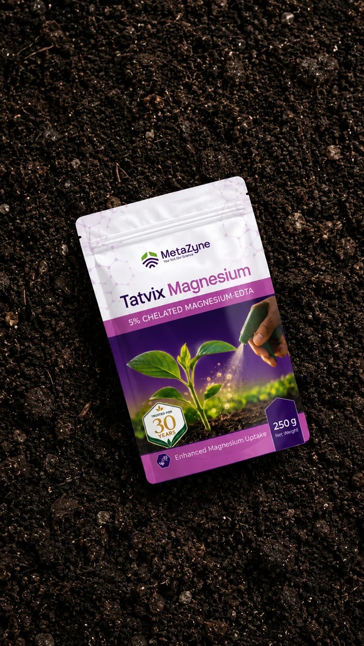 Tatvix Magnesium pack lying on bare soil beside a seedling